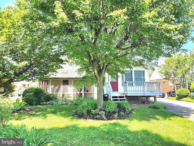 9109 Carlisle Ave, Baltimore, MD 21236 - obstructed view of property featuring a front lawn