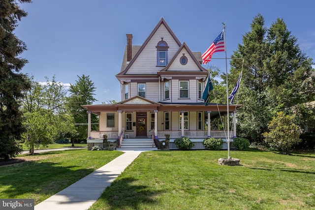 100 W Maple Ave, Merchantville, NJ 08109 - victorian house with a porch and a front lawn
