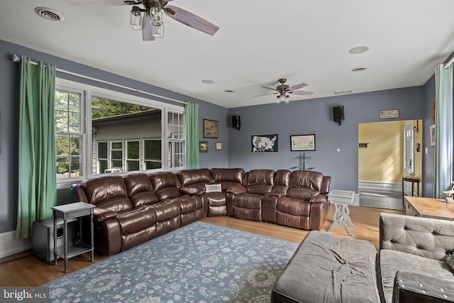100 W Maple Ave, Merchantville, NJ 08109 - living room with a ceiling fan, wood finished floors, and baseboards