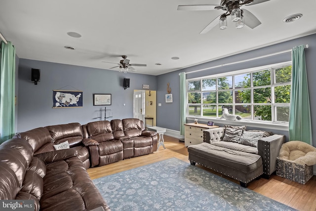 100 W Maple Ave, Merchantville, NJ 08109 - living area with ceiling fan, wood finished floors, and baseboards