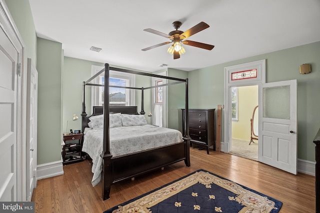 100 W Maple Ave, Merchantville, NJ 08109 - bedroom featuring wood finished floors, baseboards, and a ceiling fan