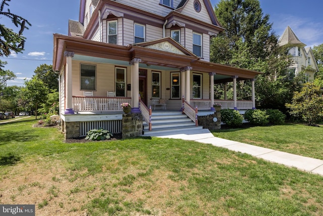 100 W Maple Ave, Merchantville, NJ 08109 - victorian house featuring a porch and a front lawn