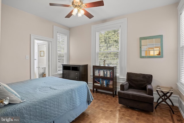 100 W Maple Ave, Merchantville, NJ 08109 - bedroom featuring multiple windows, ceiling fan, and baseboards
