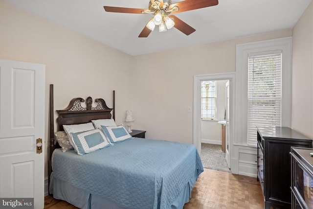 100 W Maple Ave, Merchantville, NJ 08109 - bedroom featuring baseboards, a ceiling fan, and light wood-style flooring