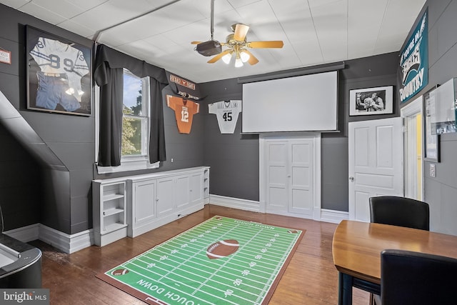 100 W Maple Ave, Merchantville, NJ 08109 - cinema with ceiling fan, wood finished floors, and baseboards