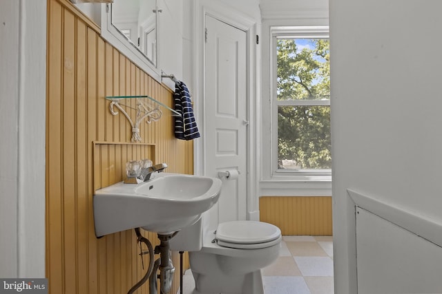 100 W Maple Ave, Merchantville, NJ 08109 - bathroom featuring tile patterned floors, toilet, and wooden walls