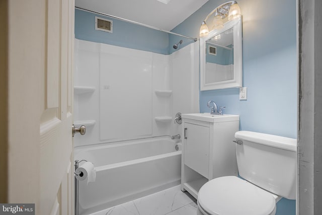 1243 Maple Ave, Wilmington, DE 19805 - bathroom with toilet, vanity, bathing tub / shower combination, and marble look tiles