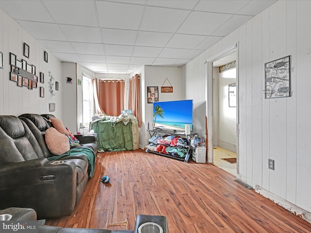 328 W 2nd St, Birdsboro, PA 19508 - living area with hardwood / wood-style flooring, wooden walls, and a paneled ceiling