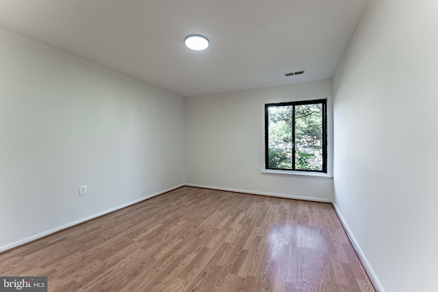 2856 Dover Ln Unit 103, Falls Church, VA 22042 - spare room with wood finished floors and baseboards