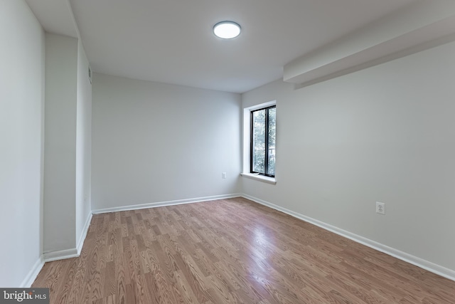 2856 Dover Ln Unit 103, Falls Church, VA 22042 - spare room with wood finished floors and baseboards