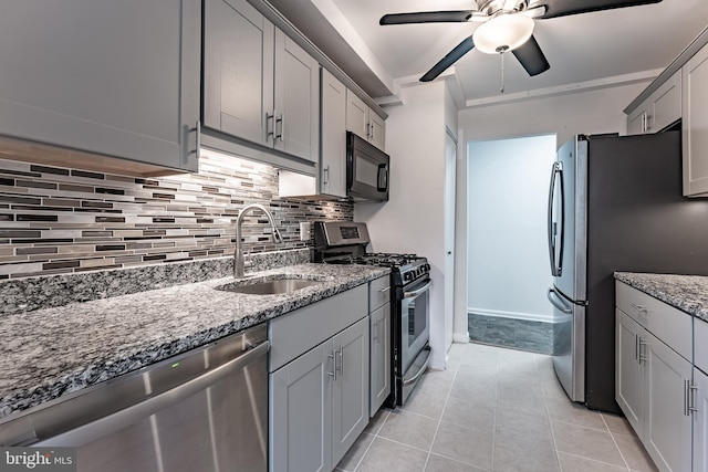 2856 Dover Ln Unit 103, Falls Church, VA 22042 - kitchen featuring appliances with stainless steel finishes, gray cabinets, backsplash, and ceiling fan