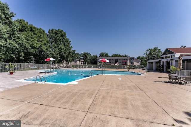 2856 Dover Ln Unit 103, Falls Church, VA 22042 - community pool featuring a patio