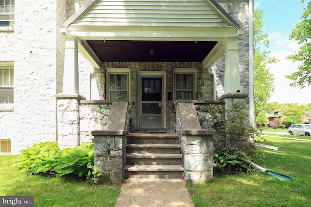 441-445 Ridge Ave, State College, PA 16803 - doorway to property featuring stone siding and covered porch