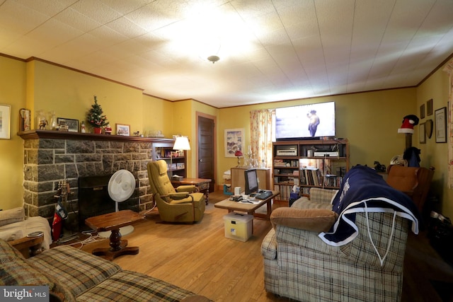 441-445 Ridge Ave, State College, PA 16803 - living area with crown molding, wood finished floors, and a fireplace