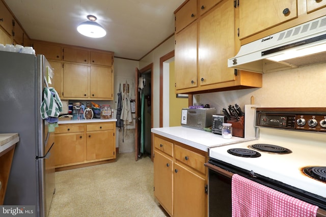 441-445 Ridge Ave, State College, PA 16803 - kitchen with range with electric stovetop, freestanding refrigerator, under cabinet range hood, and light countertops