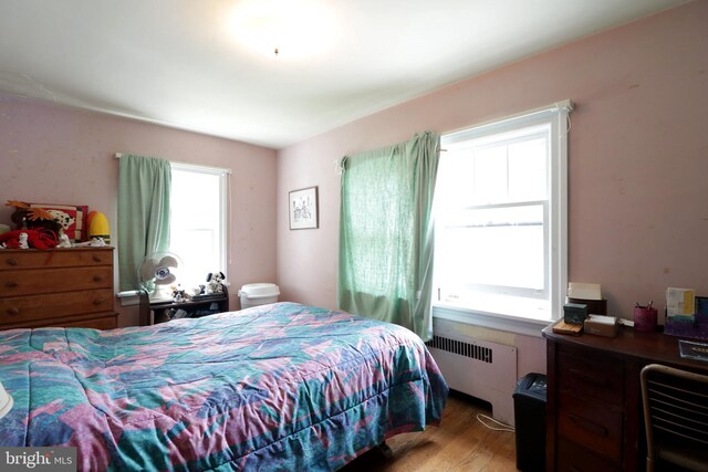 441-445 Ridge Ave, State College, PA 16803 - bedroom featuring radiator and light wood-type flooring