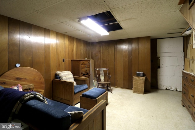 441-445 Ridge Ave, State College, PA 16803 - living area with light flooring, wooden walls, and a paneled ceiling