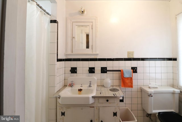 441-445 Ridge Ave, State College, PA 16803 - full bath featuring tile walls, vanity, toilet, and a shower with curtain