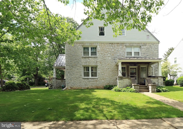 441-445 Ridge Ave, State College, PA 16803 - back of property with stone siding, a yard, metal roof, and a standing seam roof