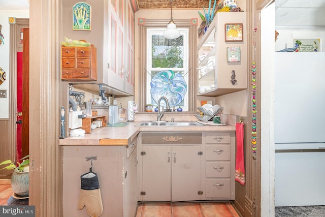 135 Lucknow Rd, Harrisburg, PA 17110 - kitchen featuring a sink, light countertops, and decorative light fixtures