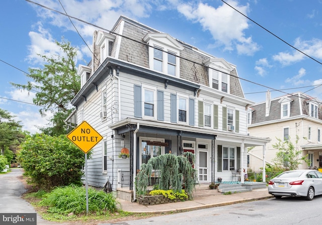 135 Lucknow Rd, Harrisburg, PA 17110 - victorian home with mansard roof, a porch, and a high end roof