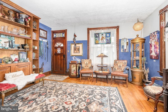 135 Lucknow Rd, Harrisburg, PA 17110 - living area featuring a textured ceiling and wood finished floors