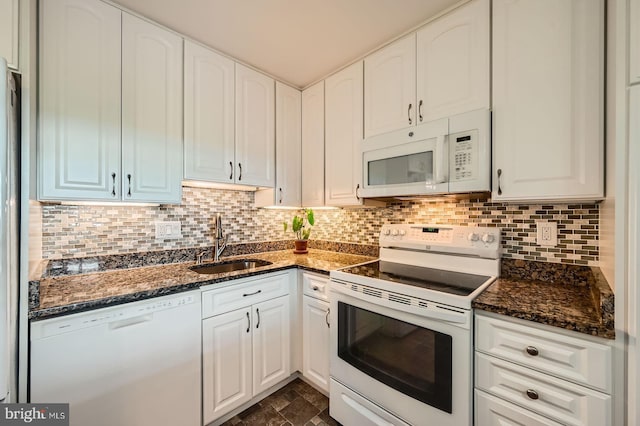 1 Smeton Pl Unit 1004, Towson, MD 21204 - kitchen with white appliances, a sink, decorative backsplash, dark stone countertops, and white cabinets