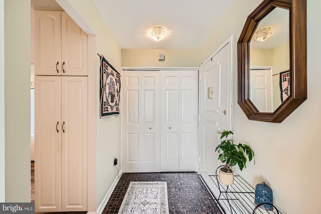 1 Smeton Pl Unit 1004, Towson, MD 21204 - foyer entrance with baseboards and dark tile patterned floors