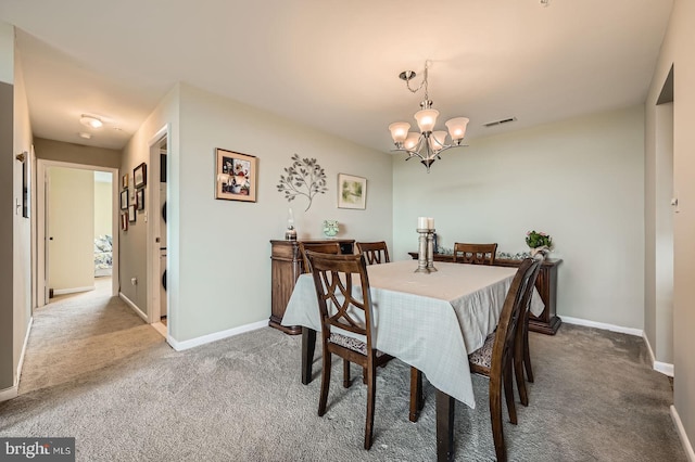 1 Smeton Pl Unit 1004, Towson, MD 21204 - dining area with carpet, a chandelier, and baseboards