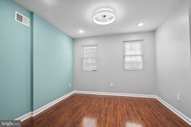 510 N Glover St, Baltimore, MD 21205 - unfurnished room with dark wood-type flooring, baseboards, and recessed lighting