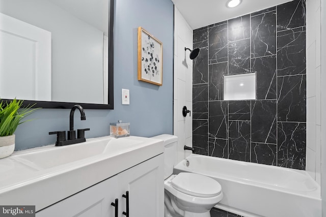 510 N Glover St, Baltimore, MD 21205 - bathroom featuring toilet, vanity, tub / shower combination, and recessed lighting