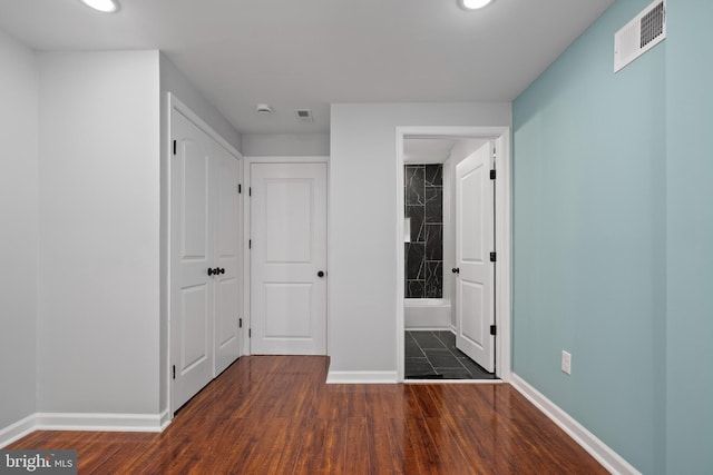 510 N Glover St, Baltimore, MD 21205 - unfurnished bedroom with baseboards, wood finished floors, recessed lighting, and a closet