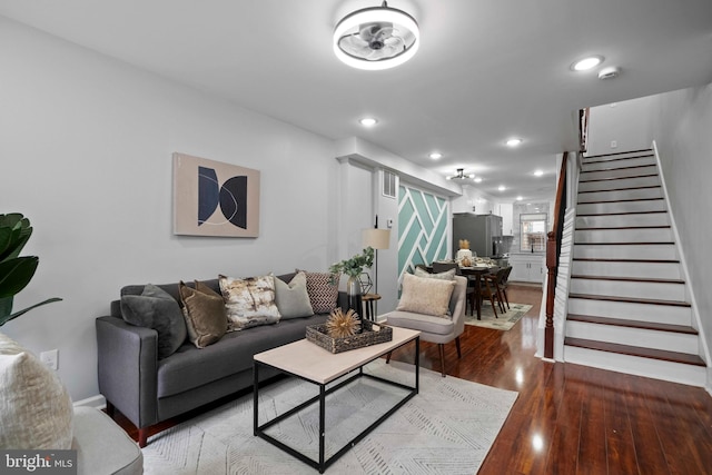 510 N Glover St, Baltimore, MD 21205 - living room featuring stairs, wood finished floors, recessed lighting, and baseboards