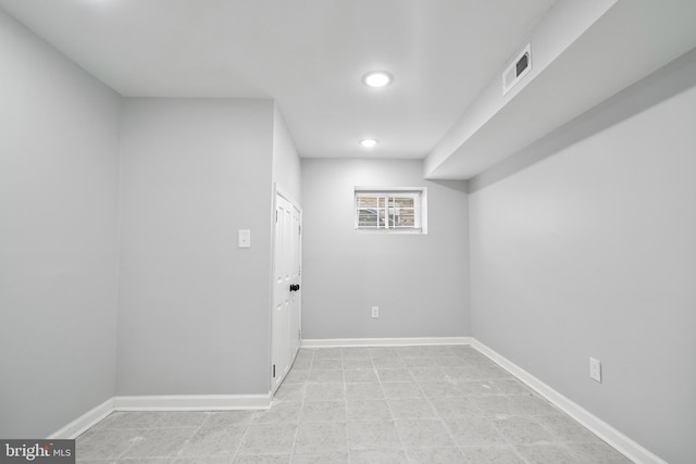 510 N Glover St, Baltimore, MD 21205 - basement featuring baseboards and recessed lighting