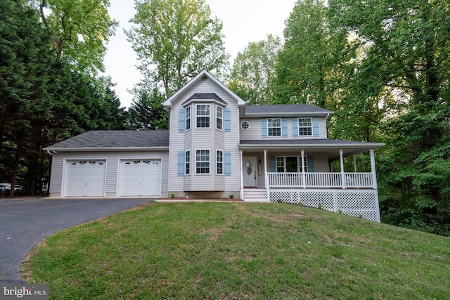 1451 Apple, Saint Leonard, MD 20685 - view of front of home featuring asphalt driveway, a garage, a porch, and a front lawn