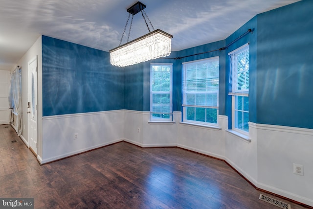 1451 Apple, Saint Leonard, MD 20685 - spare room with a chandelier, hardwood / wood-style floors, healthy amount of natural light, and a wainscoted wall