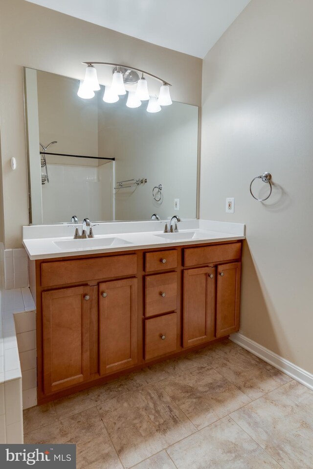 1451 Apple, Saint Leonard, MD 20685 - bathroom featuring double vanity and tile patterned floors