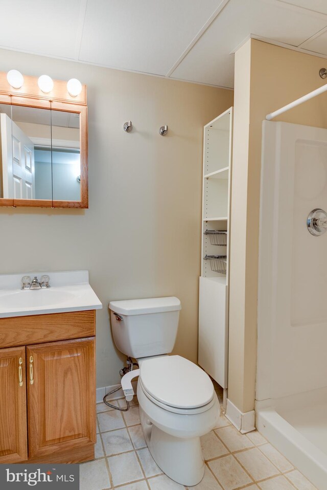 1451 Apple, Saint Leonard, MD 20685 - full bathroom with a stall shower, toilet, baseboards, and vanity