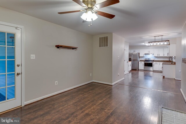1451 Apple, Saint Leonard, MD 20685 - unfurnished living room with a sink, dark wood finished floors, a ceiling fan, and baseboards