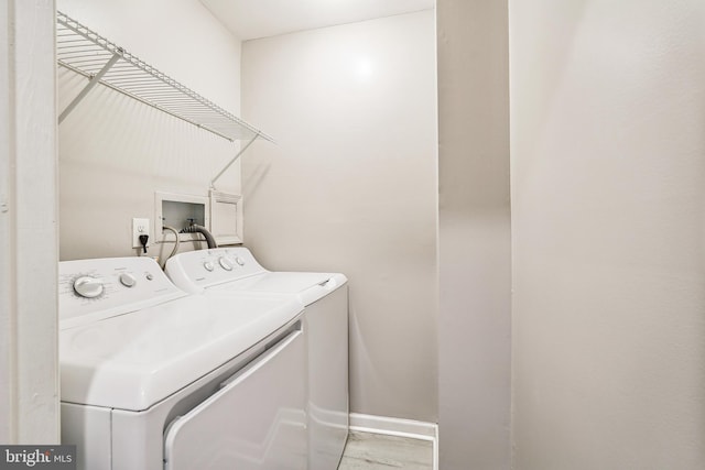 205 Highland Blvd, New Castle, DE 19720 - washroom featuring washer and clothes dryer and baseboards