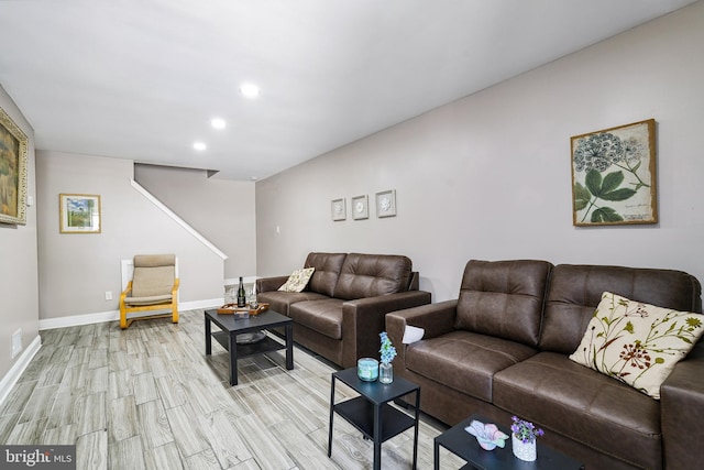 205 Highland Blvd, New Castle, DE 19720 - living area featuring recessed lighting, light wood-style floors, baseboards, and stairs