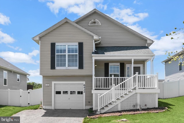 view of front of property featuring a porch, an attached garage, stairs, a shingled roof, and driveway