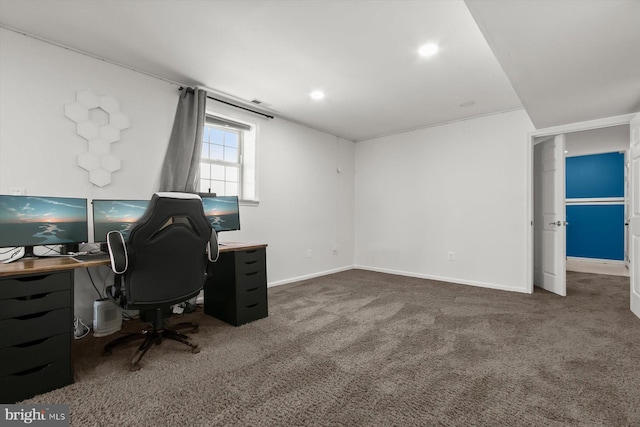 carpeted home office featuring baseboards