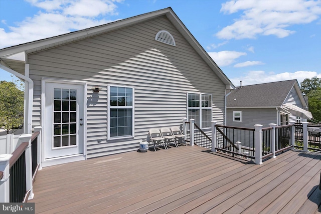 wooden deck featuring outdoor dining space