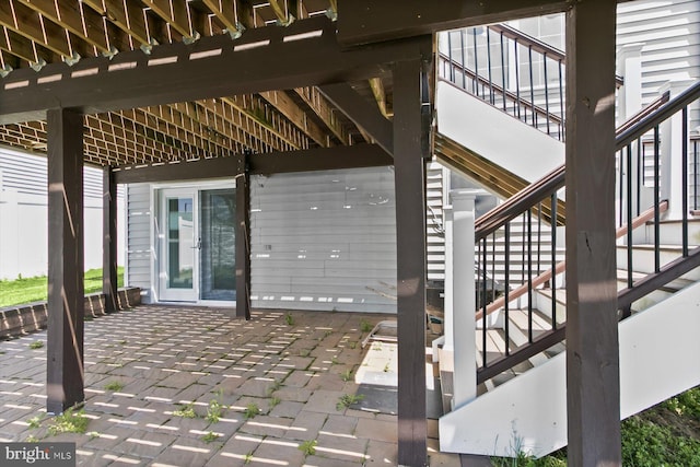 view of patio / terrace featuring stairs