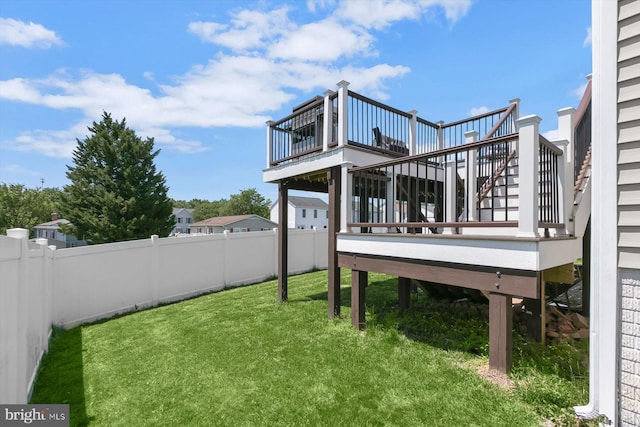 view of yard featuring stairs and a wooden deck