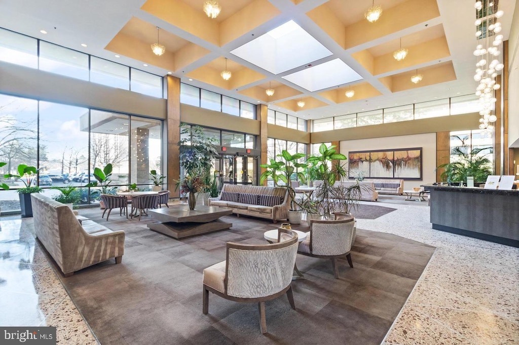 3709 S George Mason Dr Unit 305, Falls Church, VA 22041 - common area featuring a towering ceiling, coffered ceiling, recessed lighting, and beam ceiling