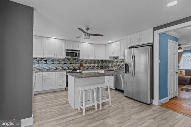 12413 Barbary Rd, Philadelphia, PA 19154 - kitchen with stainless steel appliances, ceiling fan, light wood-type flooring, white cabinets, and recessed lighting