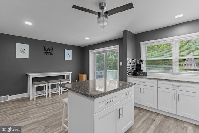 12413 Barbary Rd, Philadelphia, PA 19154 - kitchen featuring a ceiling fan, light wood finished floors, white cabinetry, a kitchen island, and recessed lighting