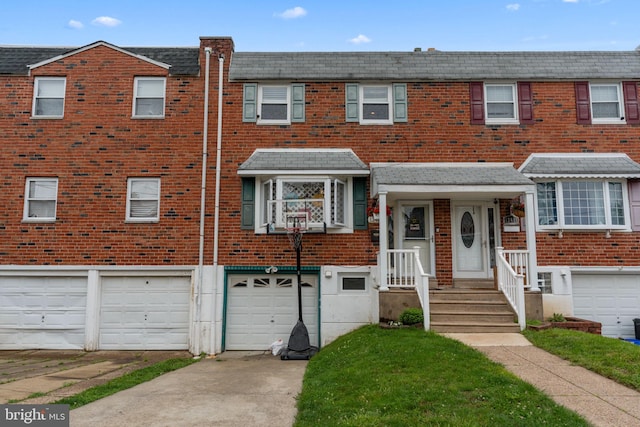 12413 Barbary Rd, Philadelphia, PA 19154 - multi unit property featuring a garage, brick siding, and driveway